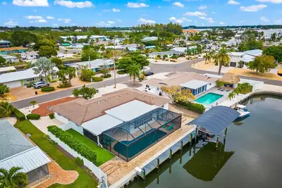 Image de Canal Front Home with Boat Dock and Pool -Bay Cruiser