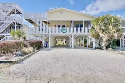 Image de Family and fun awaits you at our Tee Time Sunset Beach house! !