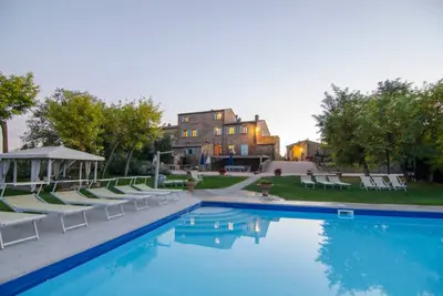 Indipendent Residence for 24 guests composed of 7 apartaments. Pool