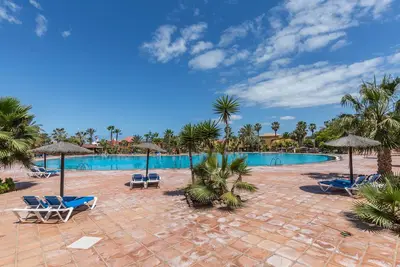 Image de Appartement \"Fuerteventura Harmony\" avec vue sur la montagne, terrasse, piscine partagée et Wi-Fi