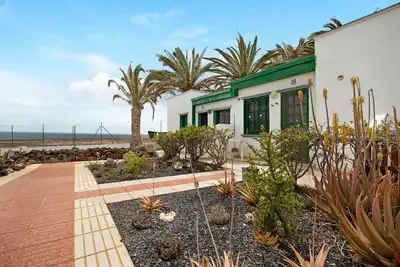 Image de Appartement \"Casa Raquel 2\" avec vue sur mer, piscine, jardin et Wi-Fi.