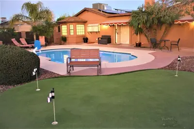Image de 5 star resort 4 bedroom, 3 bath, heated pool/spa, putting green, 7 flat screen tvs