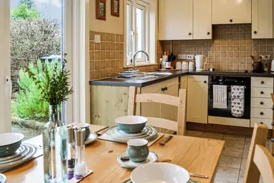 Image de A charming and beautifully furnished terraced cottage with a delightful garden to the rear.