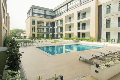 Image de Cozy property with a 5star gym, pool and a restaurant