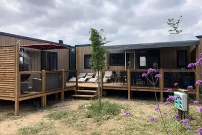 Image de Mobil-home Tribu Premium 5 chambres + terrasse 44m² + Tv + Lv + clim + plancha + 2 Sdb 10 personnes