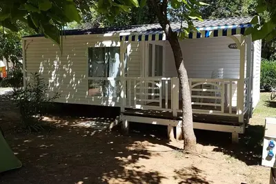 Image de Mobil-home Standard 29 m2 (2 ch- 4 pers) + überdachte Terrasse 4 Personen