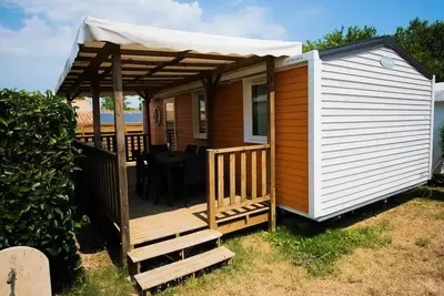 Image de Mobil home Confort 29m² (3 chambres) + clim + terrasse couverte + Tv 6 personnes