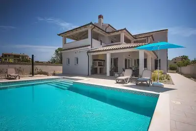 Image de Maison de vacances Premantura pour 1 - 9 personnes avec 4 chambres à coucher - Maison de vacances