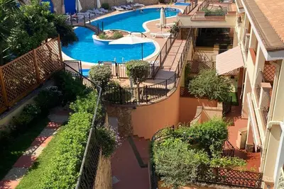 Image de Appartement \"Bilocale con Piscina\", avec terrasses, piscine partagée et climatisation