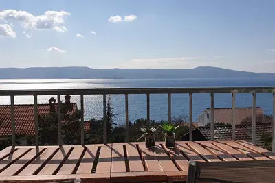 Image de Appartement de vacances avec balcon, WiFi et climatisation