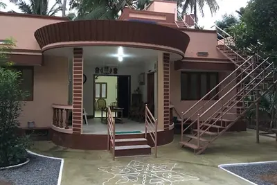 FarmStay near Pollachi amidst Coconut Trees with River Access