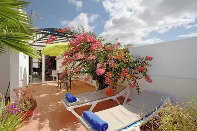 Image de Appartement 'Bungalow Aloe Dunas' avec jardin, piscine partagée et Wi-Fi rapide