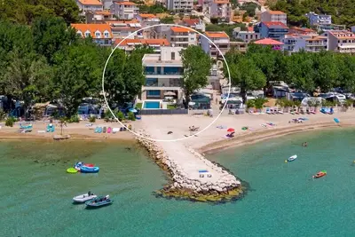 Image de Beachfront Villa Erce with private 40sqm heated pool, a Gym, 7 en-suite bedrooms, a rooftop terrace, 2 living areas