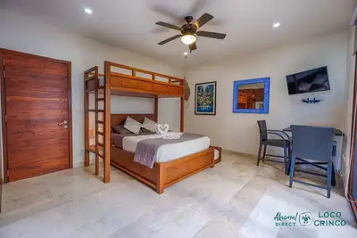 Image de Lovely garden view studio, perfect for a couple, access to beachfront pool!