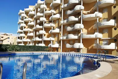 Image de Tres Dormitorios, dos Terrazas, Piscina, a Cuarenta Metros de la Arena!