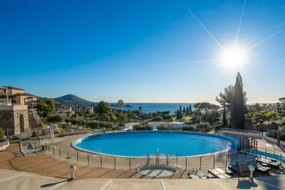 Image de Joli appartement pour 4 personnes avec Wifi, piscine, Tv, patio et parking