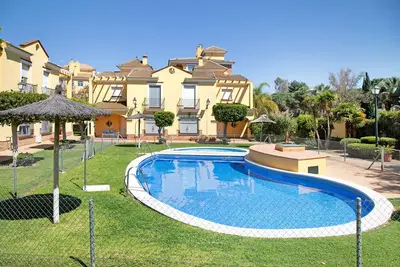 Image de Chalet 'La casa del Puerto' avec jardin, piscine partagée et Wi-Fi