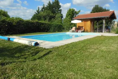 Image de Gîte spacieux à Renaison avec cheminée, jardin et équipements enfants