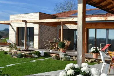 Image de Gîte en bois avec piscine naturelle, 3 chambres avec terrasses privatives