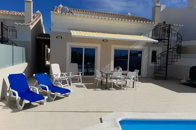 Image de New villa with pool in Salema Ideal location lovely sea and countryside views.