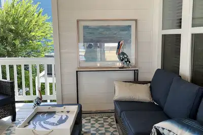 Literally feet away from the beach. Newly remodeled! Perfect for a party of 2-8