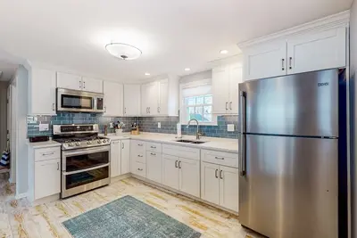 Image de Cute house near the beach with central Ac, high-speed WiFi, gas grill, and yard