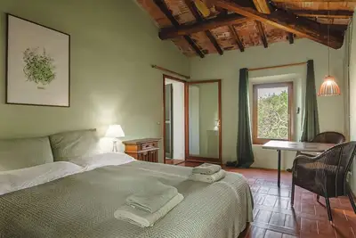 Podere Mencoini stylish villa with private pool and olive garden.