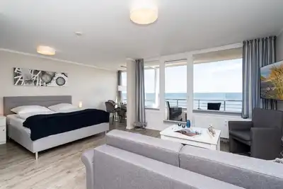 Image de Modern app. with balcony, sea view, parking space, Wlan. Pets allowed.