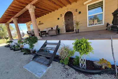 Classic and  comfort cabin within trees, vine and olive trees
