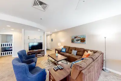 Image de Top-floor corner courtyard home with pool, gym, & game system
