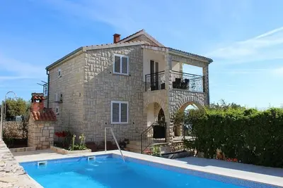 Image de Apartment Villa Jakov - Two Bedroom Apartment with Terrace and Swimming Pool