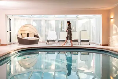 Image de Appartement \"Alpenhof Lodge Almrose\" avec vue sur les montagnes, piscine et Wi-Fi