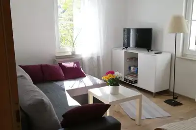 Image de Vacation apartment on Lake Constance with conservatory, garden with barbecue house for up to 6 people.