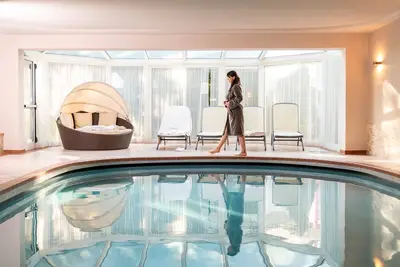 Image de Appartement \"Alpenhof Lodge Almrose iii\" avec vue sur la montagne, piscine et Wi-Fi
