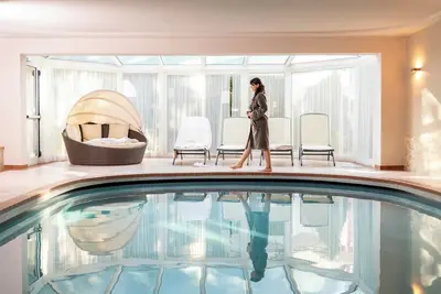 Image de Appartement \"Alpenhof Lodge Almrose ii\" avec vue sur les montagnes, piscine et Wi-Fi