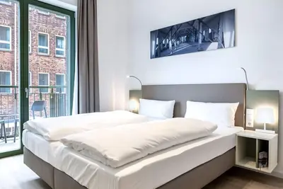 Image de Harbor apartment in top location with balcony and use of the in-house sauna area - Krusespeicher