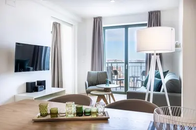 Image de First-class harbor apartment with balcony, use of sauna and great view! - Crust storage