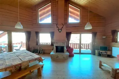 Image de Chalet, 300m du centre station, vue montagne, terrasse, cheminée ou poêle à bois, parking