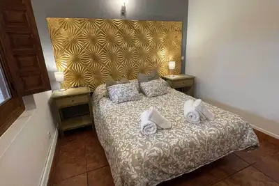 Image de La Casa de la Maestra 1 is a charming house, typical of a town, with a warm and welcoming decoration.