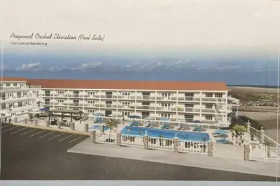 Image de For the discriminating family seeking a true Ocean Front vacation! This new, highly upgraded Oceans 7 condominium is located directly on the Beach Front with direct access to our award winning Beach! Enjoy the Cool Sea Breeze and Ocean Views from you