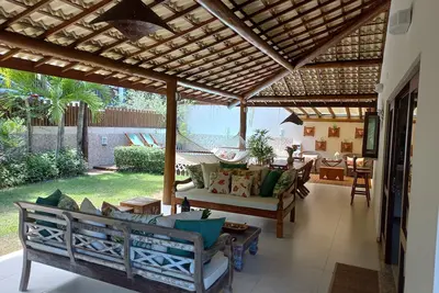 Image de Praia do Forte, cozy house with 4 bedrooms, swimming pool, wi-fi and gourmet area,