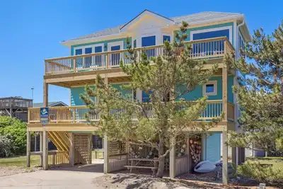 Image de 4 br *1 Min Walk to Beach