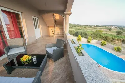 Image de Maison de vacances privée avec climatisation, bain à remous, Wifi, piscine privée, Tv, terrasse