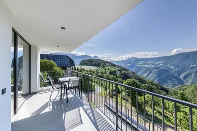 Image de Appartement \"Thalerhof Naturae Montes Ritten\" avec vue sur les montagnes, terrasse et Wi-Fi