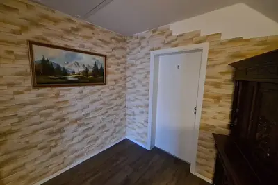 Image de Appartement-Salle de bain privée séparée-Vue ville-2. Obergeschoss