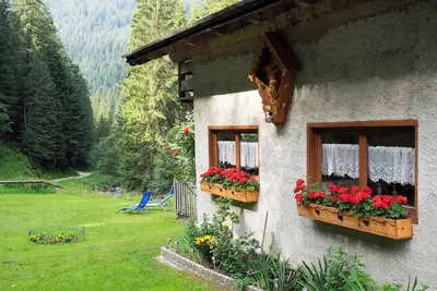 Image de Chalet 'Baita Florinda' avec vue sur les montagnes, jardin et Wi-Fi