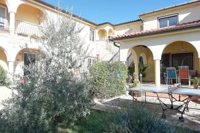 Image de Appartement de vacances Avec air conditionné et terrasse