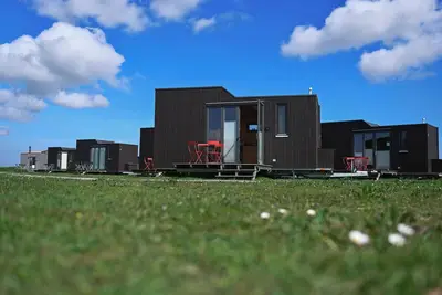 Image de Sustainable overnight experience in the Green Tiny House Nature on the North Sea