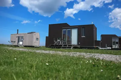 Image de Sustainable overnight experience in the Green Tiny House Nature on the North Sea