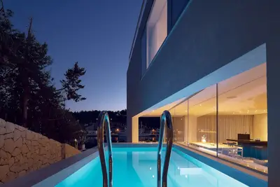 Image de Seaside villa with panoramic harbor view with stunning sunsets.